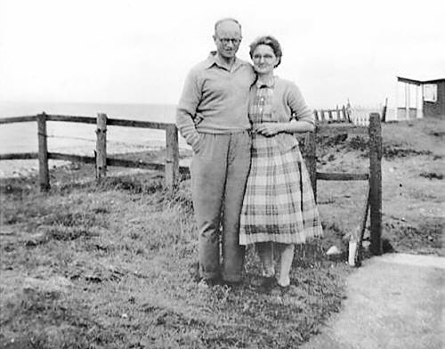 Mam and Dad (Reg and Cis James) at The Cabin; Northolme in the background
