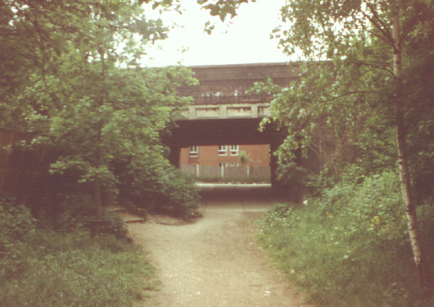 London, UK. Summer 1980. Muswell Hill Road bridge on former railway line to Alexandra Palace, from east.