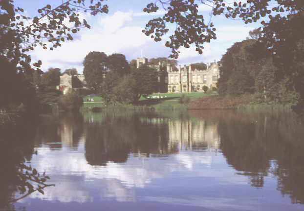 Nottinghamshire, England. Early autumn 1987. Newstead Abbey over the Garden Lake.