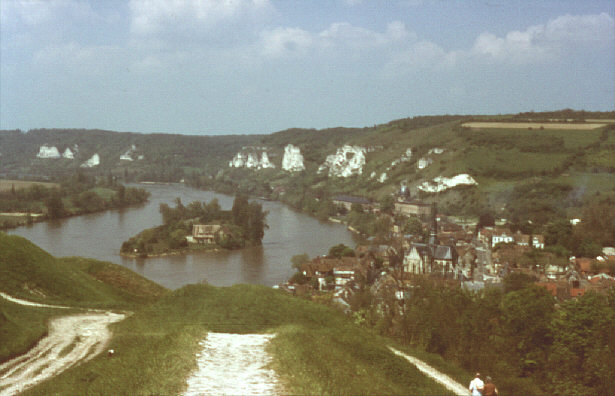 Lower Seine valley, France. Spring 1985. Looking over town of Les Andelys and River Seine from approach to Chateau Gaillard.