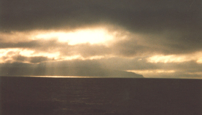 Londonderry coast, Northern Ireland. Summer 1988. Sunset over County Donegal, from Portstewart.