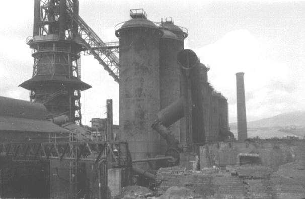 Millom ironworks, Cumbria, UK. Summer 1968. Blast furnace array from west