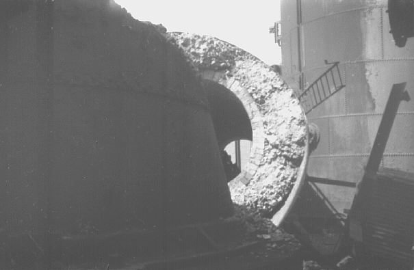 Millom ironworks, Cumbria, UK. Summer 1968. Demolition in progress, showing cross section of stove