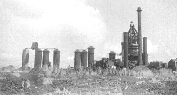 Millom ironworks, Cumbria, UK. Summer 1968. East end of blast furnace array from north