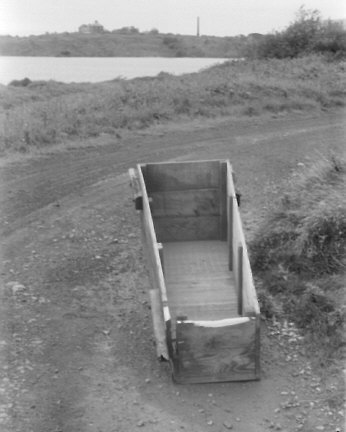 Hodbarrow iron ore mine, Cumbria, UK. Summer 1968. Suspiciously coffin-like box abandoned by the lagoon