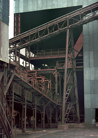 Millom ironworks, Cumbria, UK. Summer 1968 or 69. Conveyors into working shed, by Dennis Bradbury