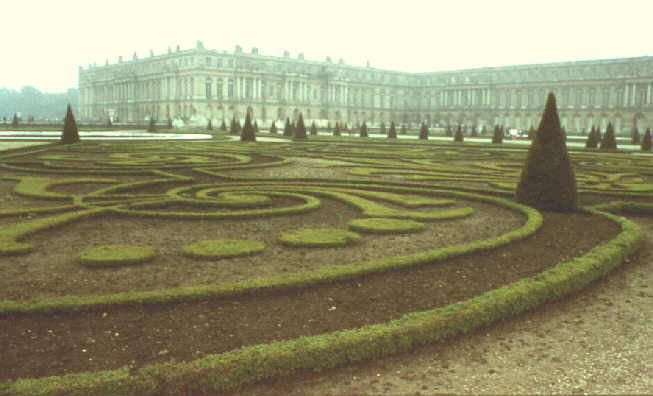 Versailles, France. Spring 1985. View from west over formal gardens to central and south ranges of main palace (chateau).